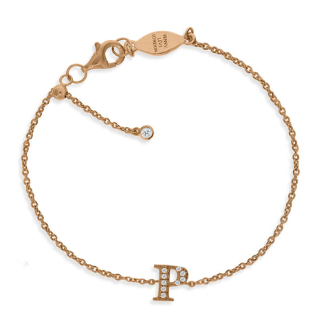 
Rose gold plated initial bracelet on a silver chain with cubic zirconia stones and an adjustable sliding size adapter.

