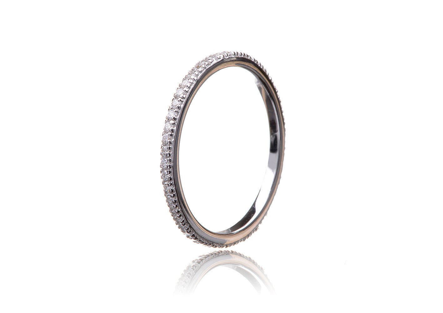 
Narrow pave stacking ring in sterling silver with Cubic Zirconia stones.

