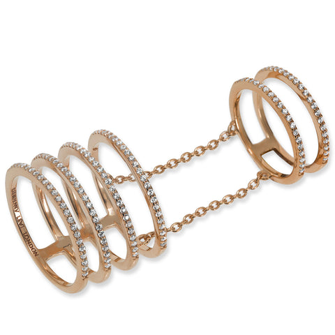 
Elegant rose gold plated on silver four band half pave ring with chain-attached finger rings.

