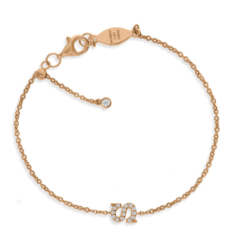 
Rose gold plated sterling silver initial bracelet with cubic zirconia and sliding size adapter.

