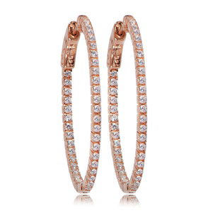 
Rose gold plated silver hoop earrings with cubic zirconia detailing and special safety lock, length 4.80 cm, width 4.00 cm.

