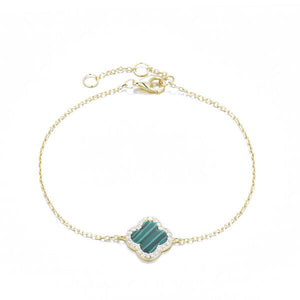 
Gold-plated silver bracelet with a malachite clover charm.

